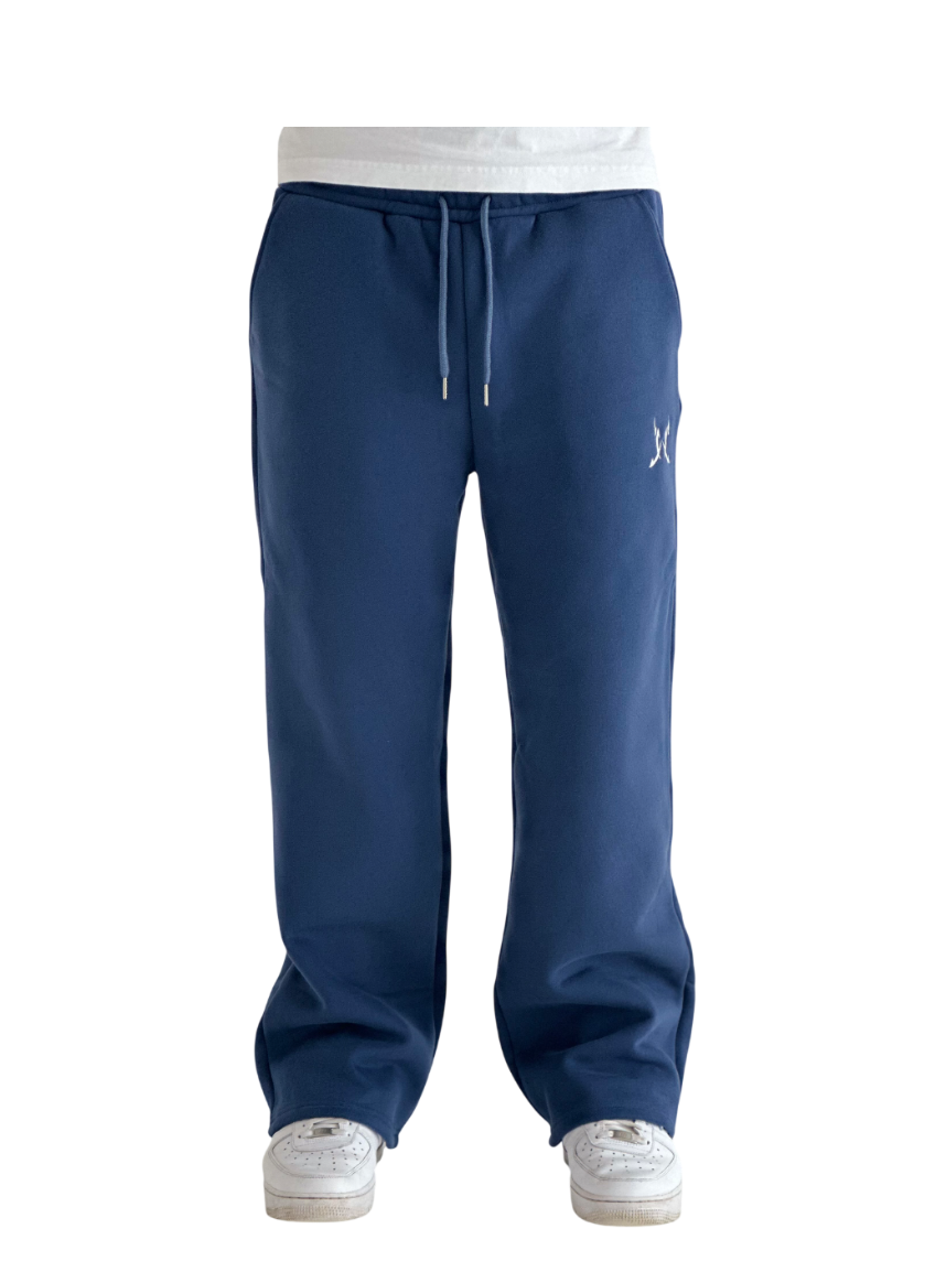 Navy blue sweatpants with a logo on a white background