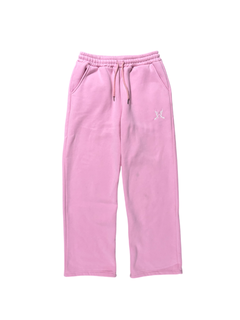 Pink sweatpants with a logo on a white background