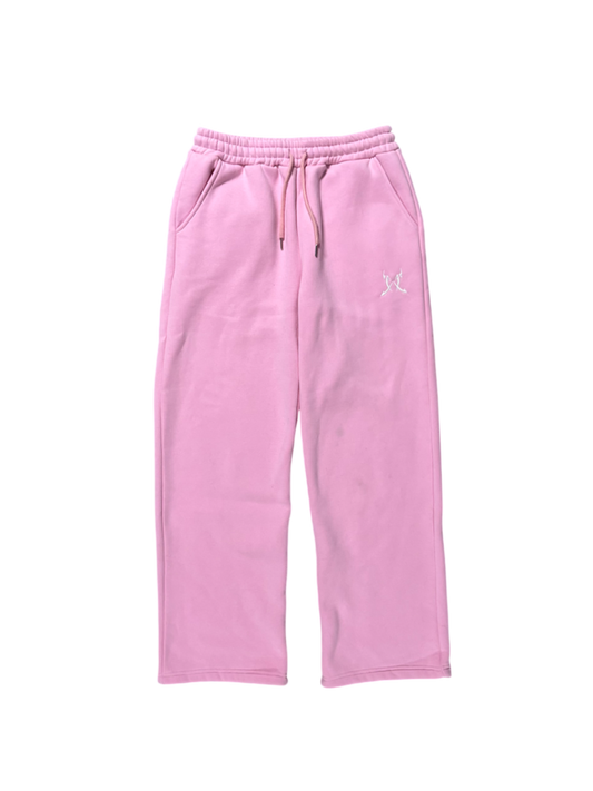 Pink sweatpants with a logo on a white background