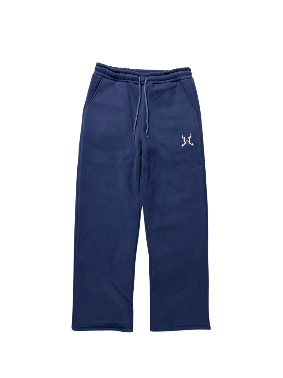 Navy blue sweatpants with a small white logo on a white background
